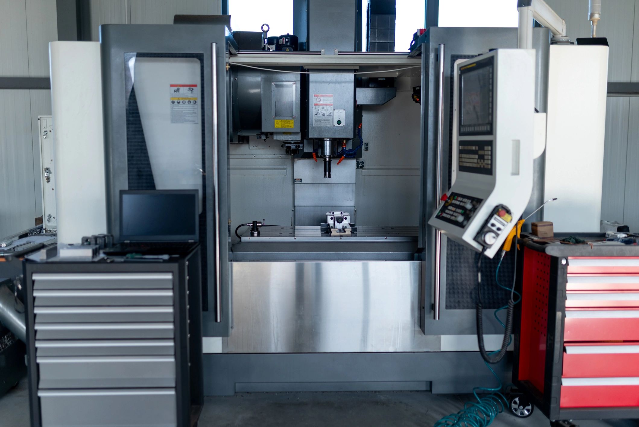 Vertical CNC machining center in a modern industrial plant
