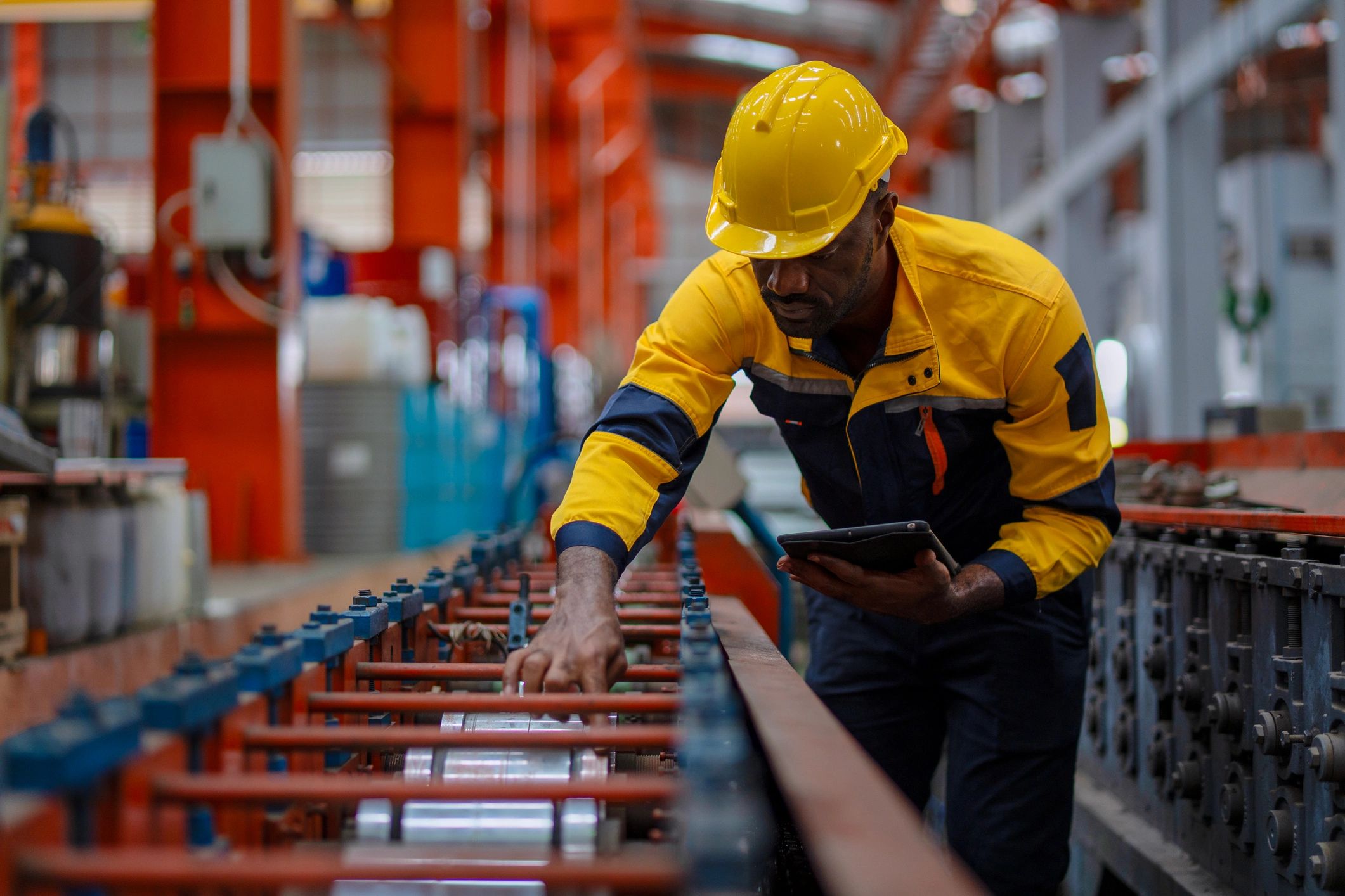 Industrial professional inspecting precision manufacturing work